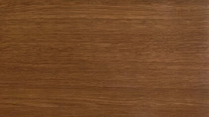 Close-up of dark brown wood grain on a polished tabletop surface.