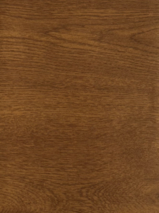Close-up of a warm brown wooden surface with a visible grain pattern and smooth finish