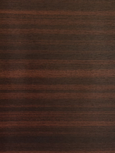 Close-up of dark brown wood with subtle grain pattern.