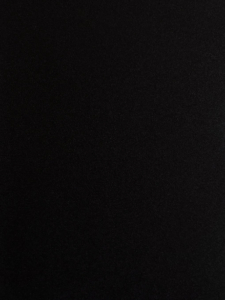 Black textured fabric background suitable for a banner or hero section.