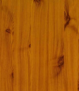 Close-up of a warm, orange-brown wooden surface with visible grain patterns and knots.